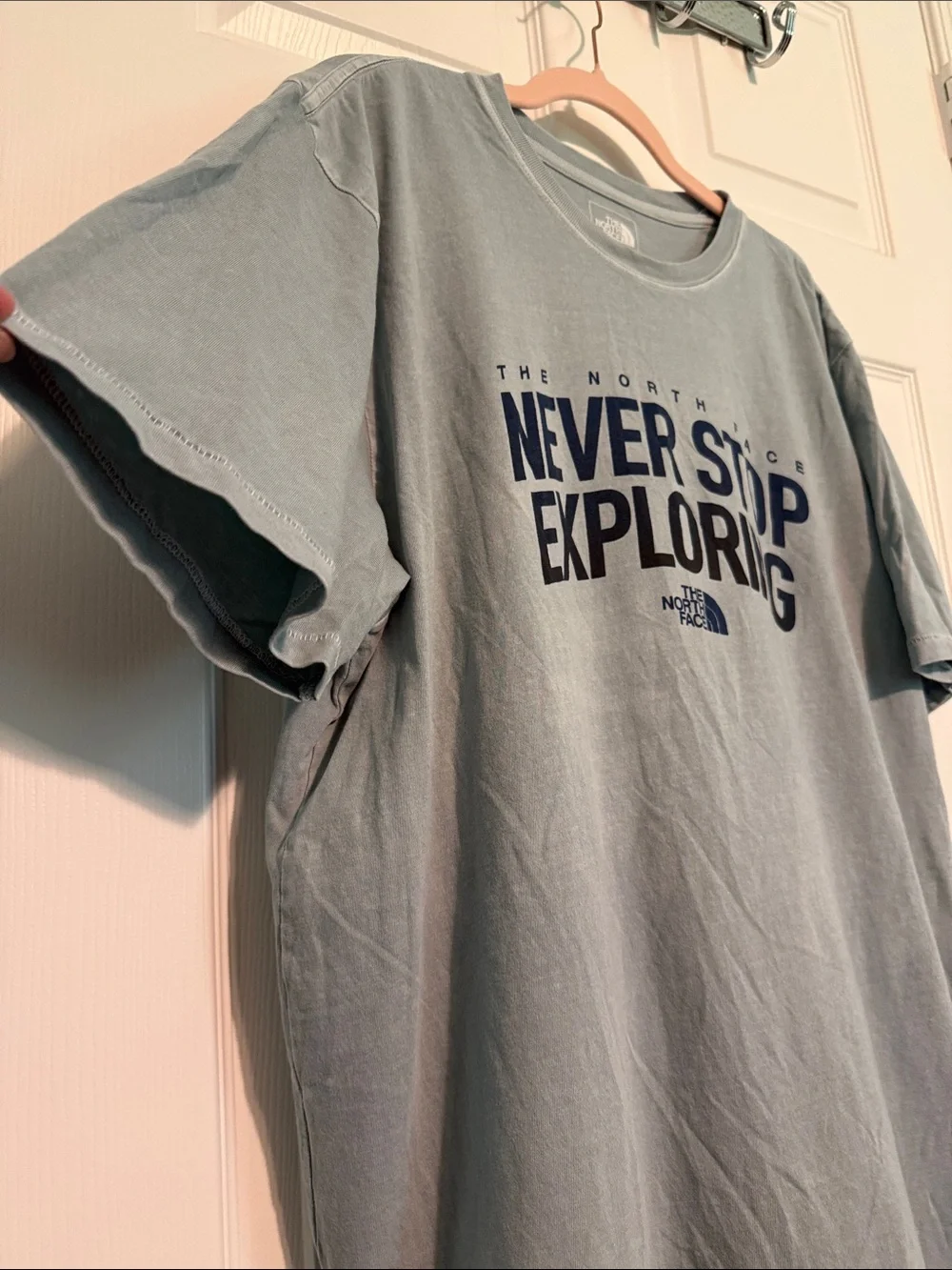 The North Face Sage Green Tee with Navy 'Never Stop Exploring' Print
